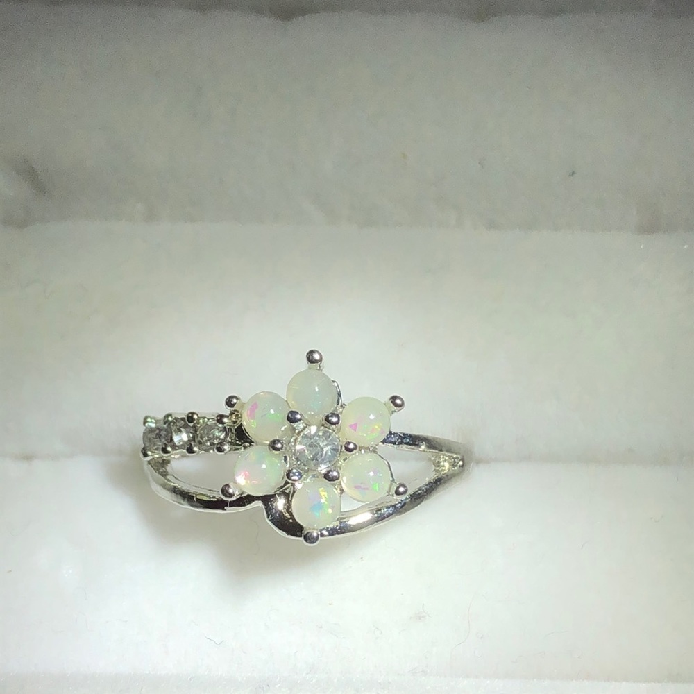 Opal colored and clear stones size 8 .925 silver ring